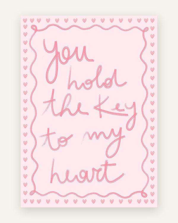 Børneplakat med you hold the key to my heart i lyserøde toner til pigeværelset